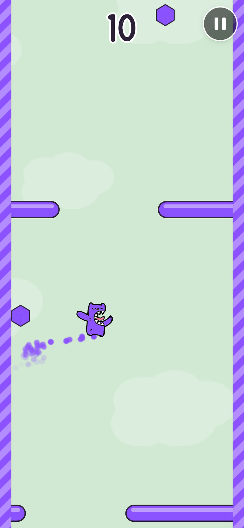 Chomp Drop gameplay: a purple monster with a trail between purple pill bars on a mint sky, a cube to chomp, score 10.